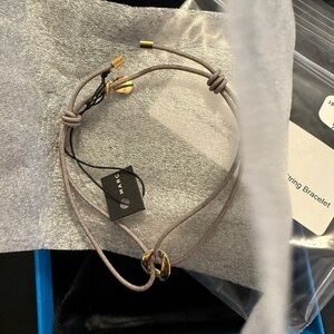 Marc by Marc Jacob’s zinc and gold tone string bracelet- NWT